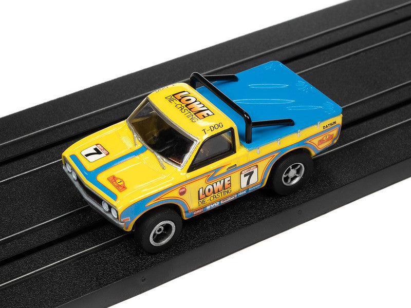 1975 Datsun 620 (X-traction)
Rally X-Traction - 2023 Release 3 - Version B
1975 Datsun 620 Pickup Truck (New Casting) (X-traction) Although not originally designed for rally racing, the 1975 Datsun 620 pickup truck was a popular choice for rally enthusiasts due to its light weight and nimble handling.