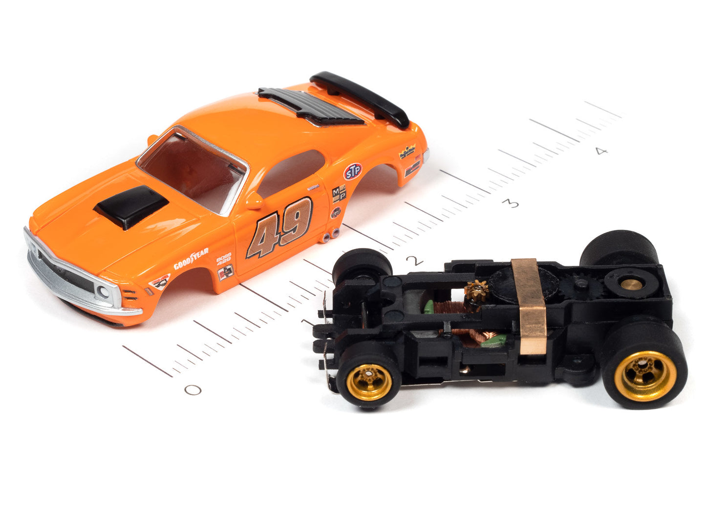 The Auto World 1:64 scale CrossTrax Road Course 9' Slot Race Set Layout with two slot cars and is engineered to go fast, offering hours of fun-filled racing excitement! Recommended for ages 14 and up.