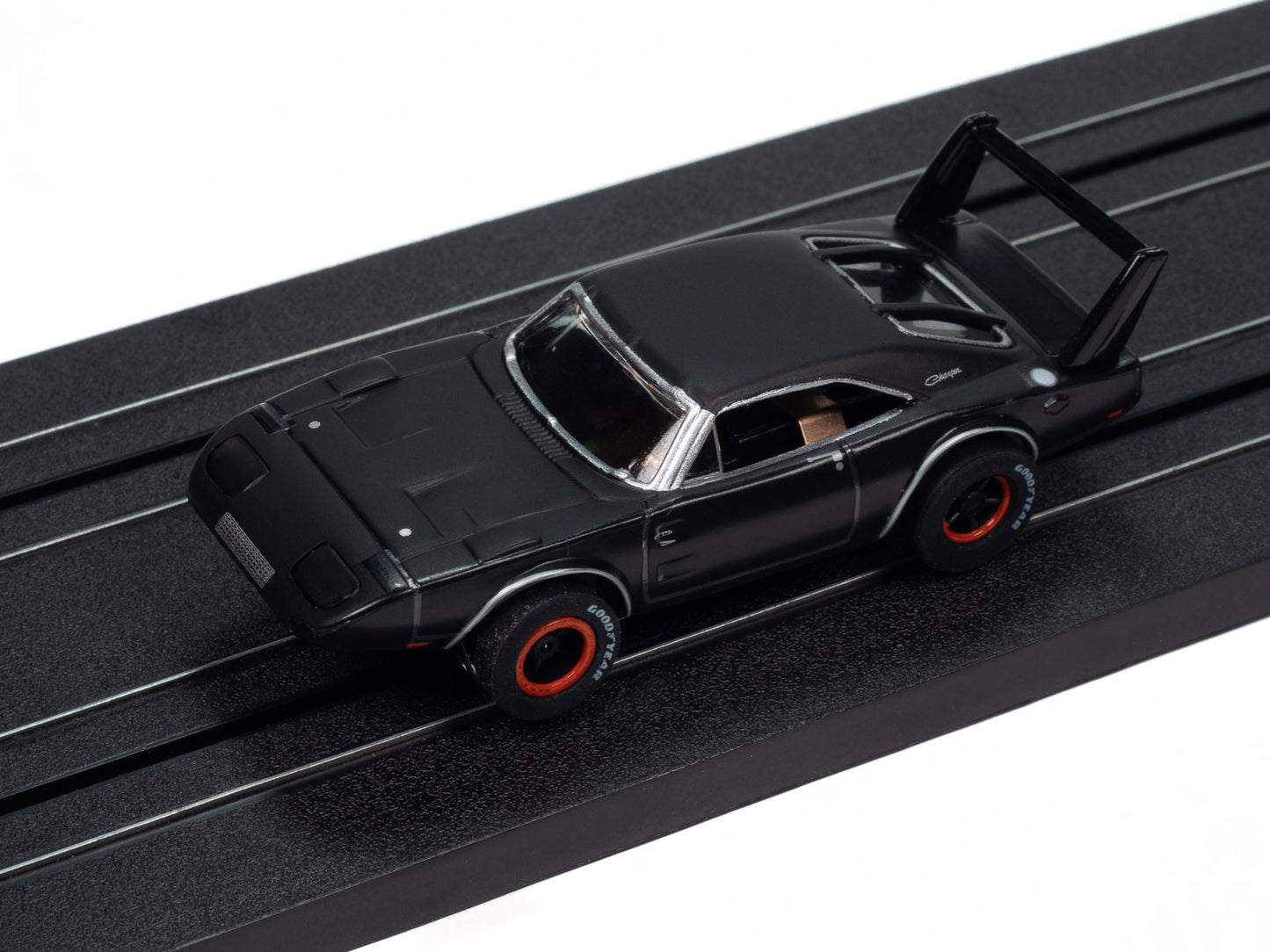 1969 Dodge Daytona – Flat Black, Auto World XTraction Chassis. Shown on track.
