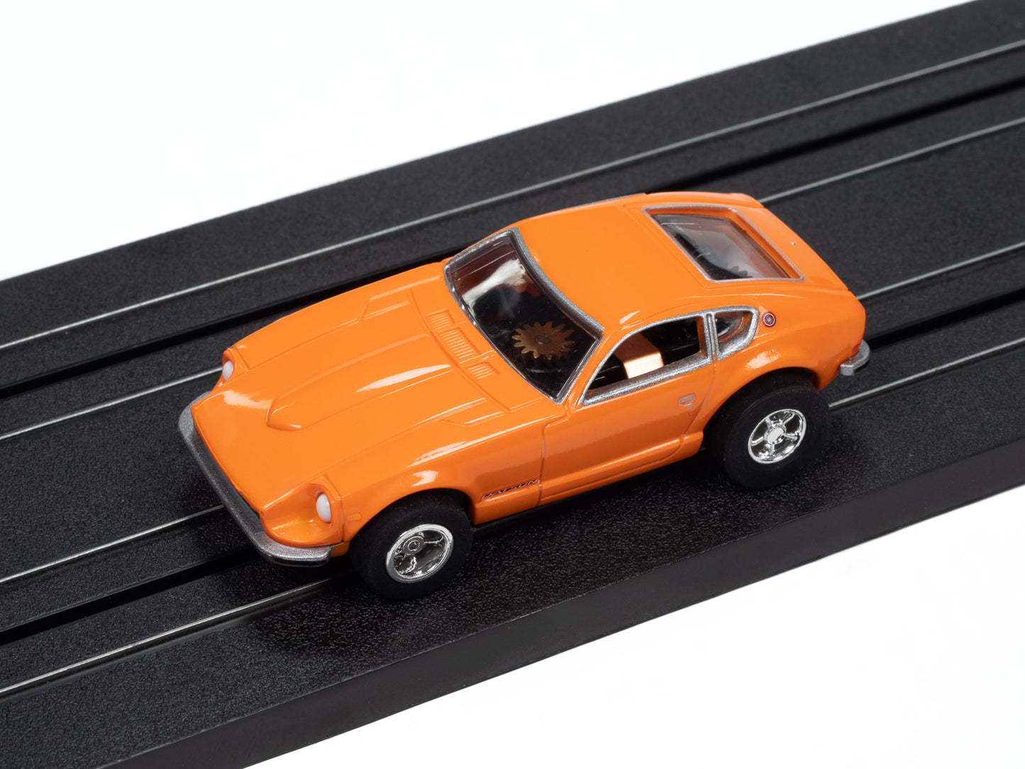 1973 Datsun 240z – Orange
Auto World XTraction Chassis, shown on track.