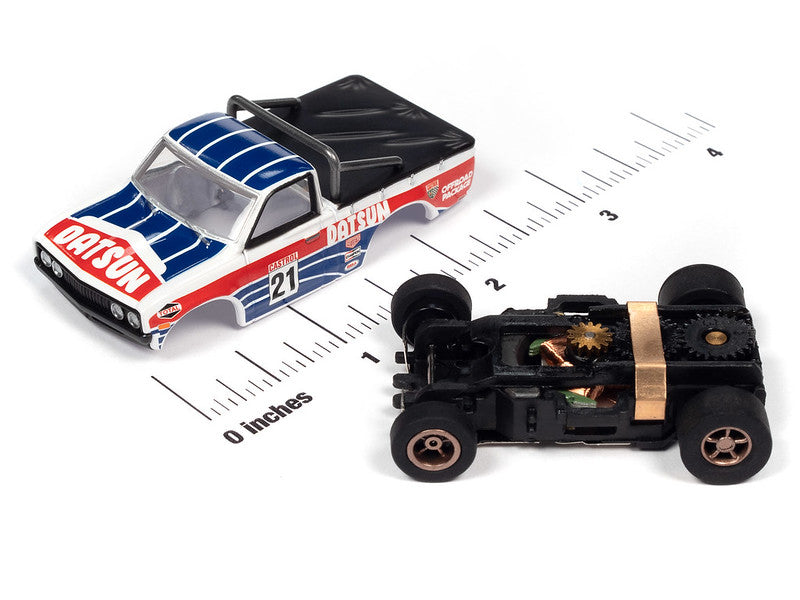 Auto World Slot Cars, 1975 Datsun 620 Pickup Truck (New Casting) (X-traction) Although not originally designed for rally racing, the 1975 Datsun 620 pickup truck was a popular choice for rally enthusiasts due to its light weight and nimble handling.