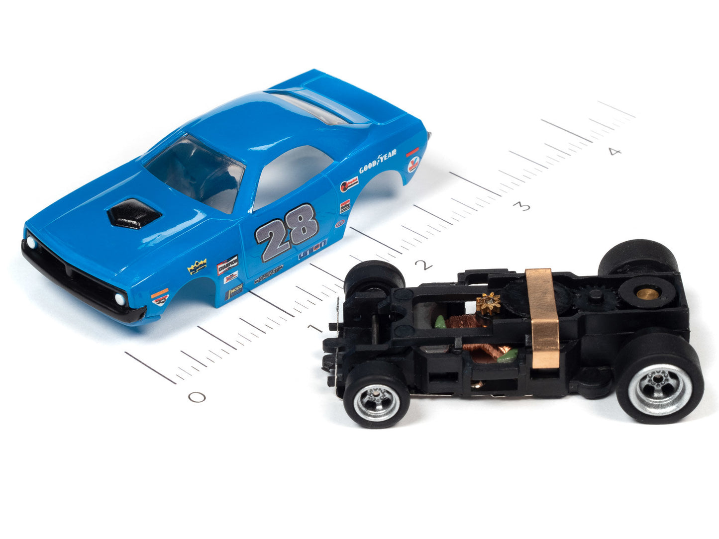 The Auto World 1:64 scale CrossTrax Road Course 9' Slot Race Set Layout with two slot cars and is engineered to go fast, offering hours of fun-filled racing excitement! Recommended for ages 14 and up.
